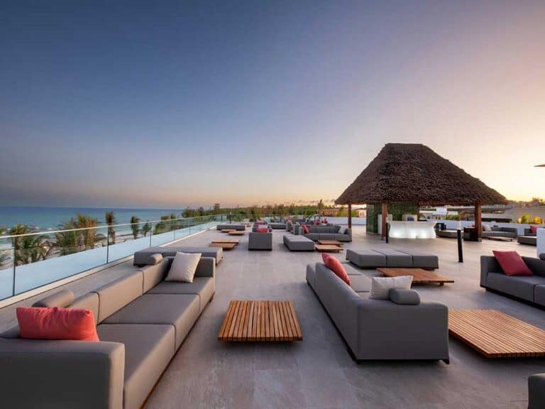 Luxury rooftop lounge with ocean view at The Mora Zanzibar.