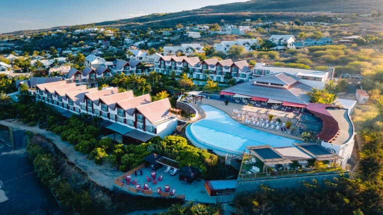 Aerial view of Akoya Hotel and Spa with pool and surrounding landscape.
